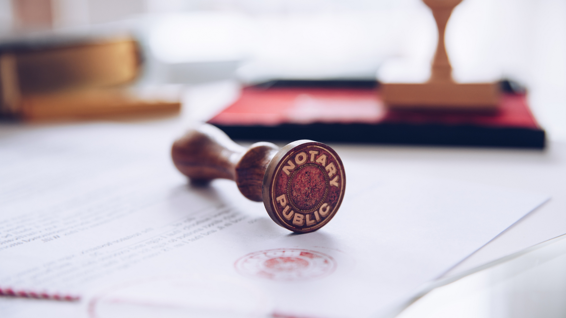 A notary stamp is sitting on top of a piece of paper.
