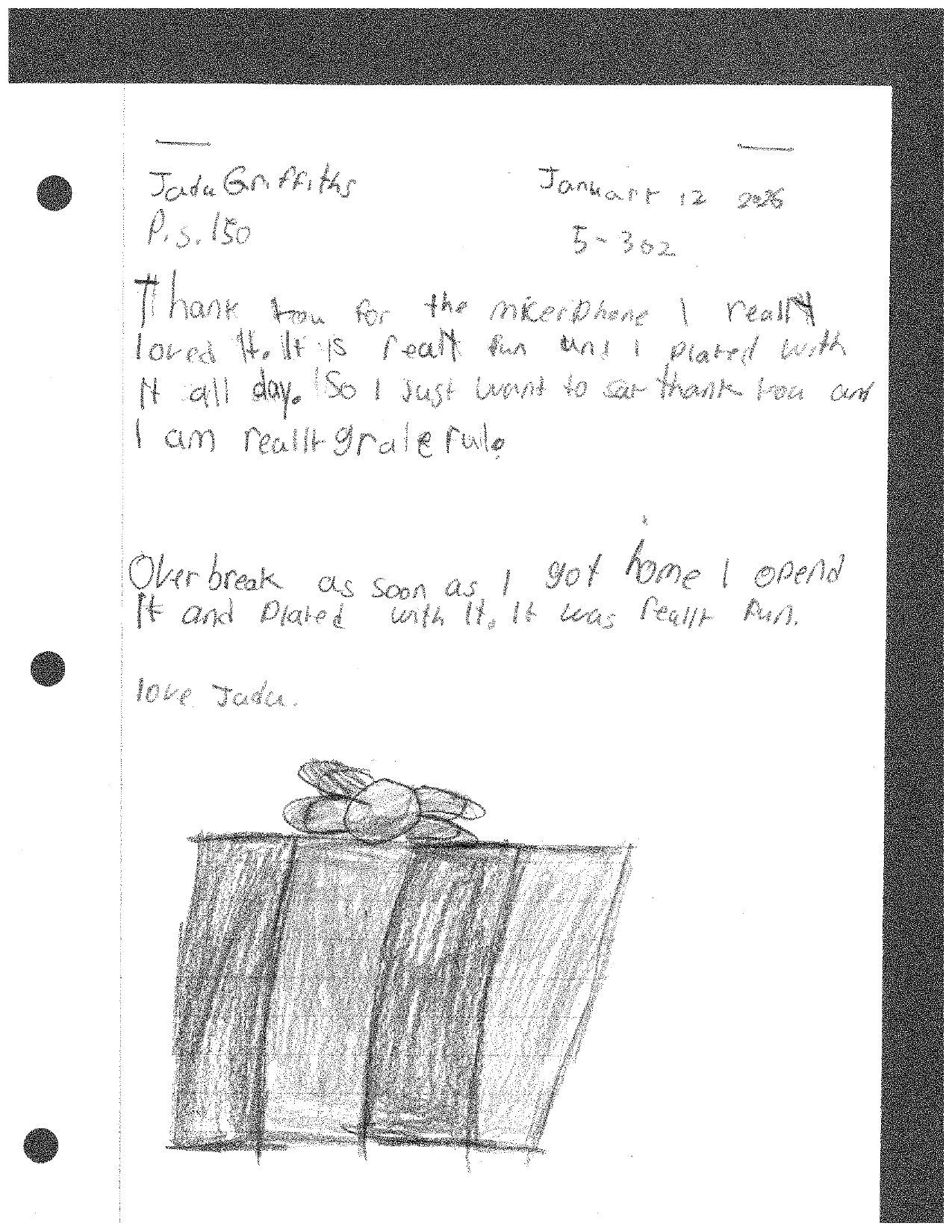 Handwritten thank-you note with a drawing of a present, next to text including 