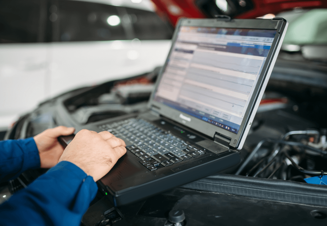 a mechanic doing a vehicle diagnostic service