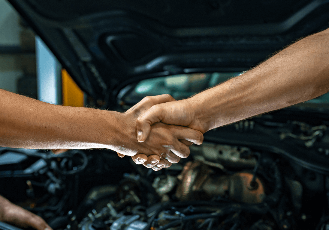 mechanic shaking hands