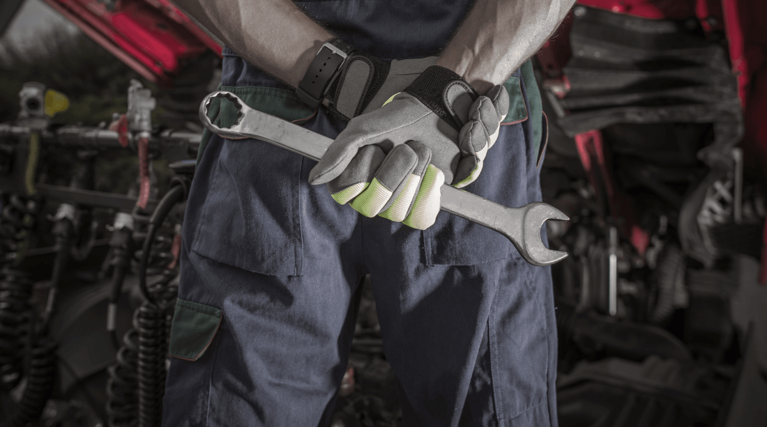 A mechanic holding a wrench in Shereport