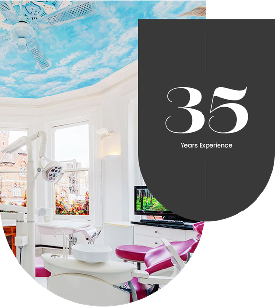 Interior of Hampstead Clinic with dental chair and unique ceiling painting, also showcasing 35 years of experience