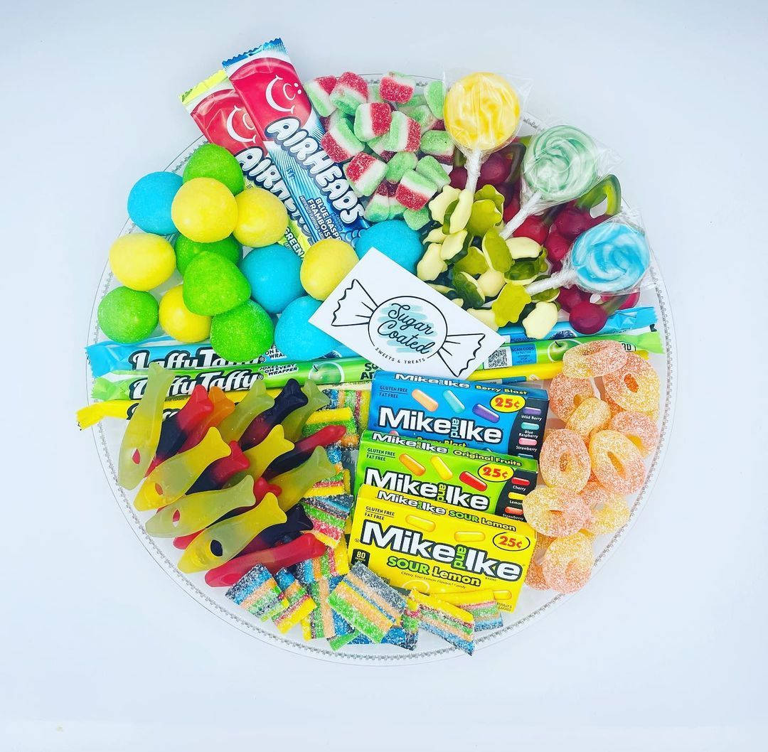 There are many different types of candy on the plate.