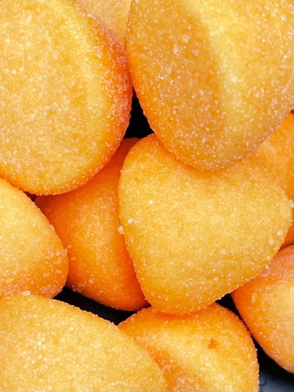 A close up of a pile of fried potatoes