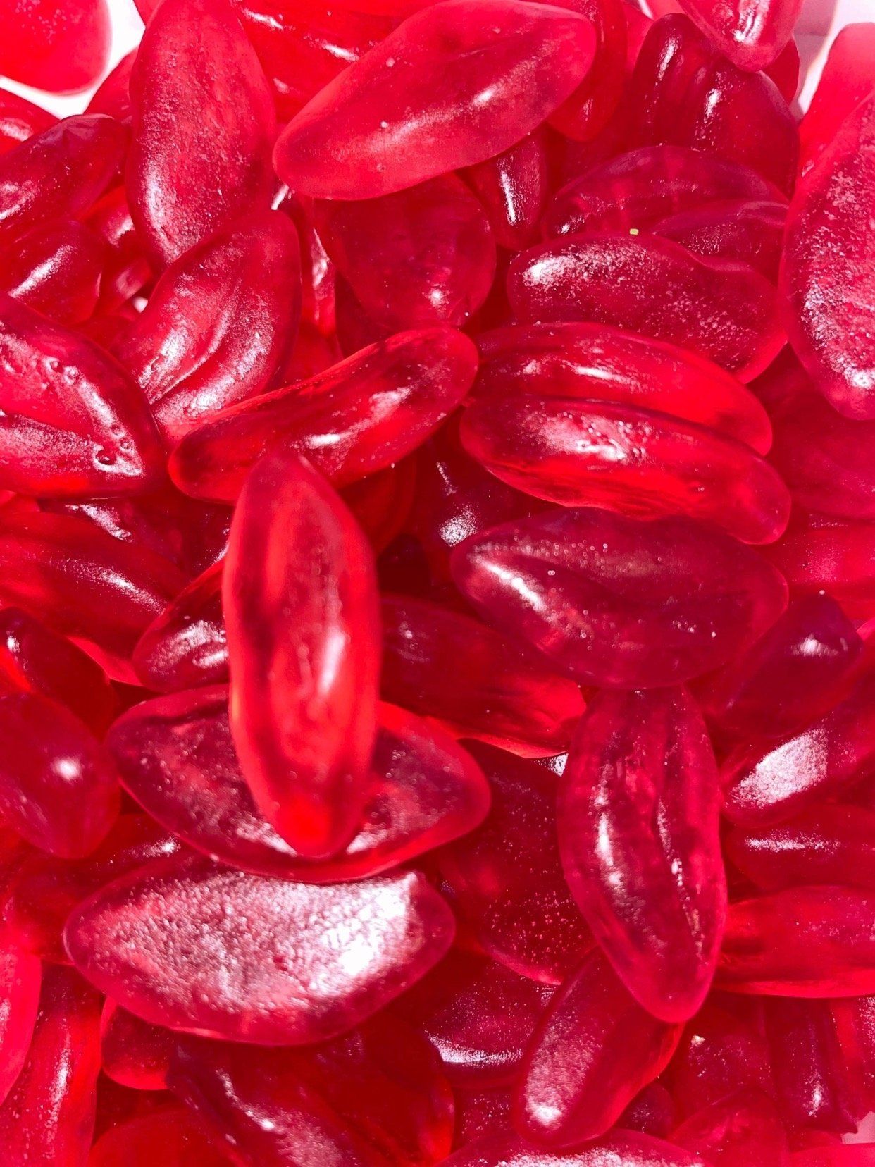 A pile of red candy in the shape of lips