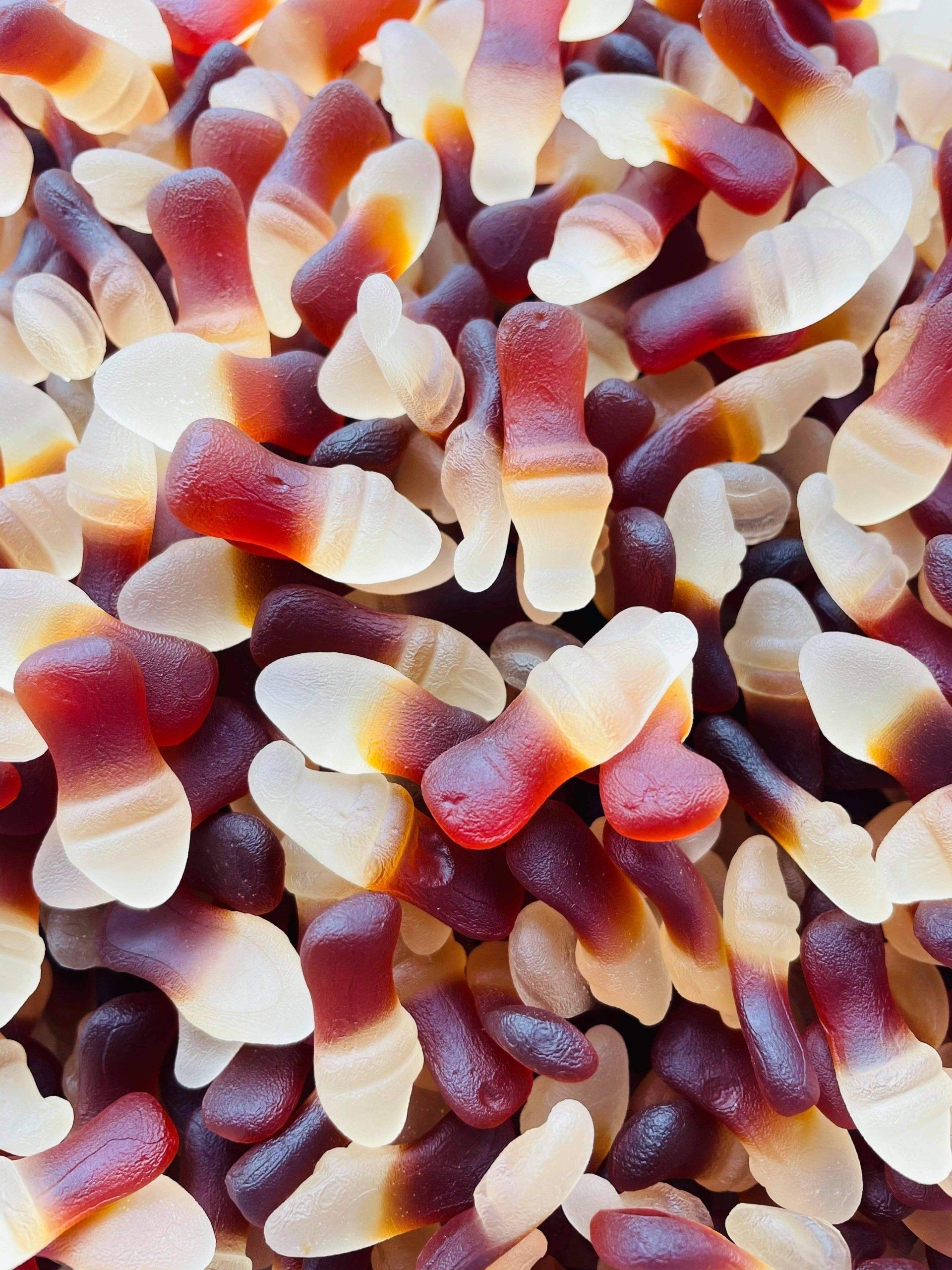 A close up of a pile of gummy candy corn
