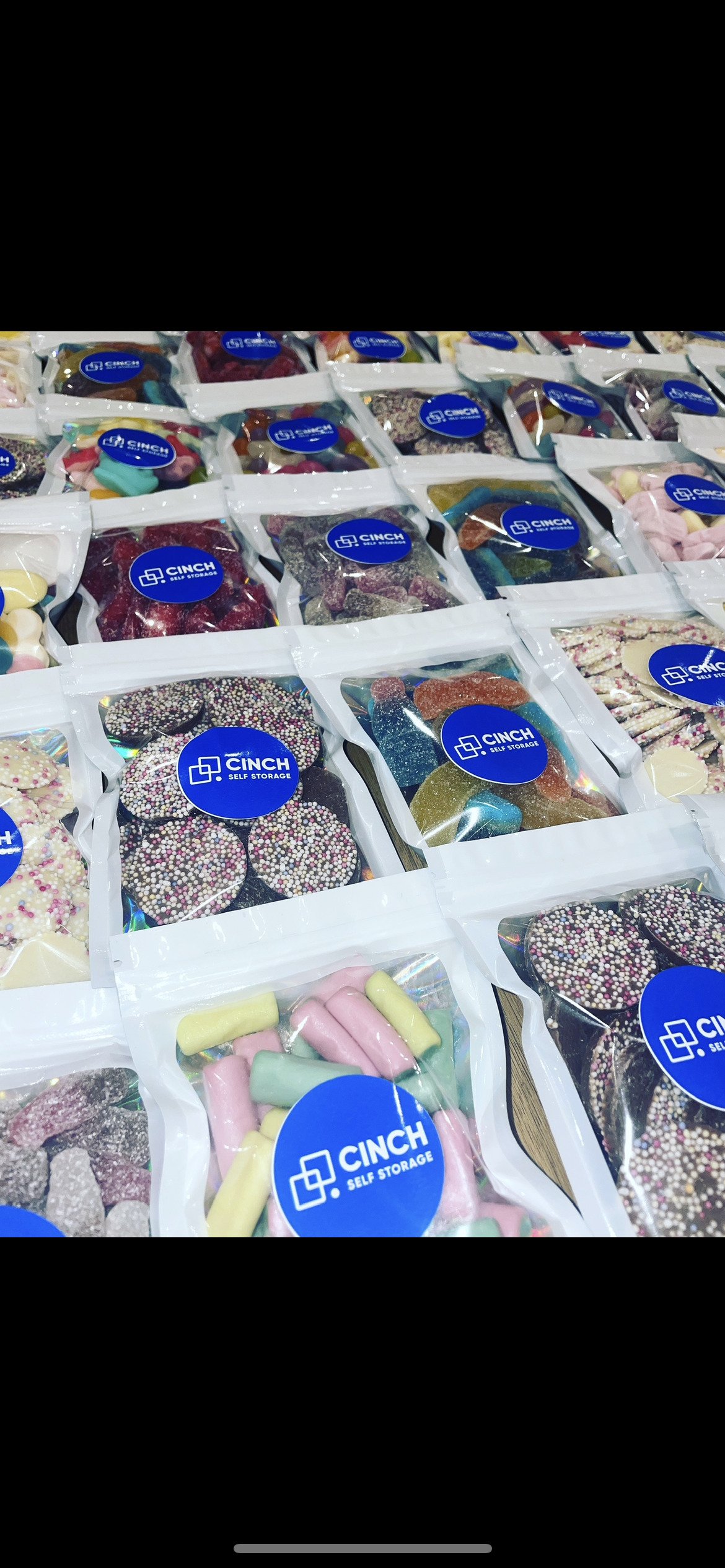 A bunch of boxes filled with different types of candy.