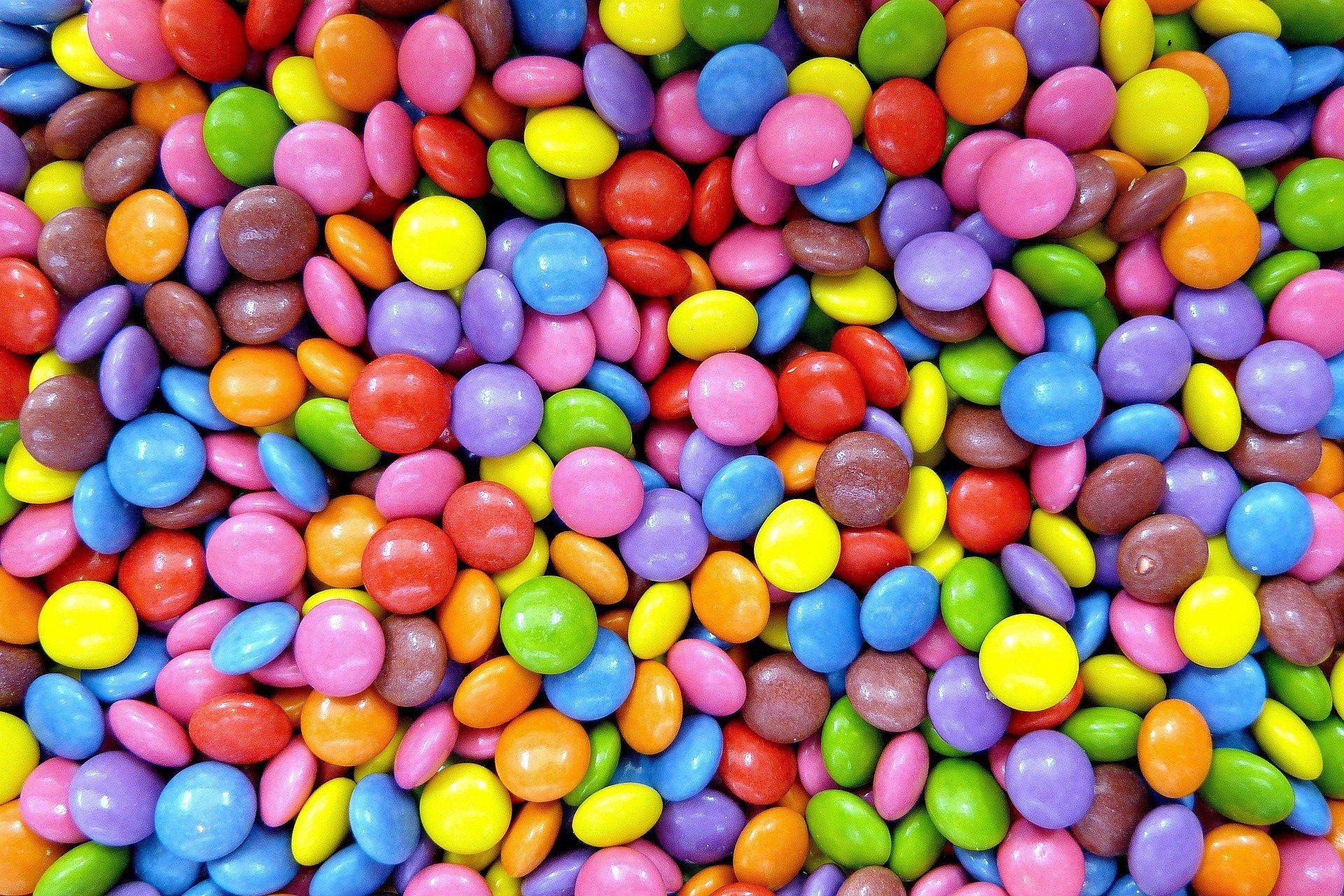 A close up of a pile of colorful candies