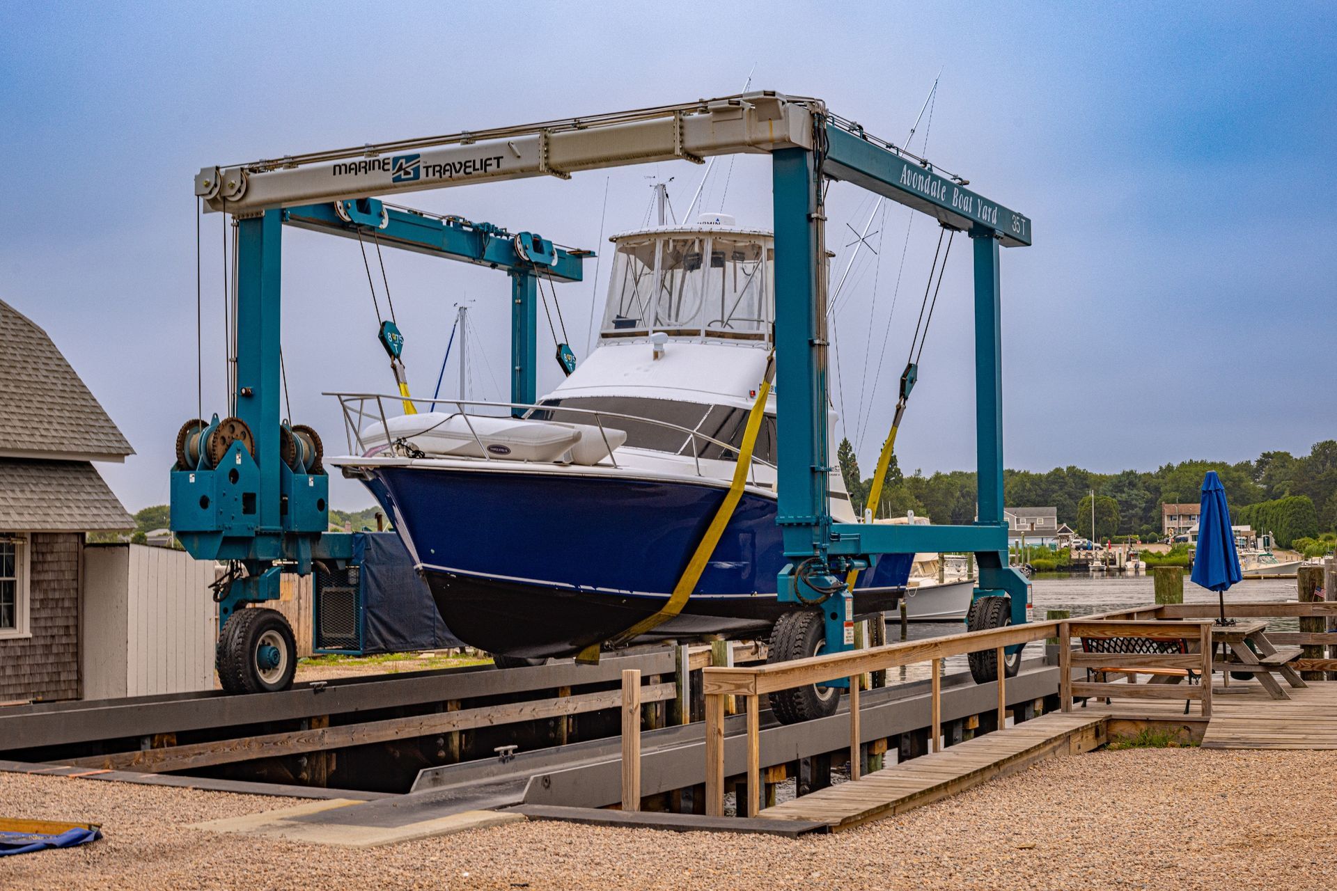 A boat is sitting on top of a boat lift.