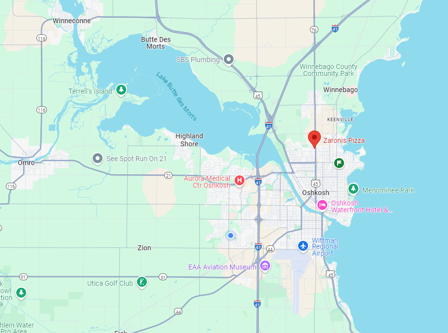 A map of a city with a lake in the background.