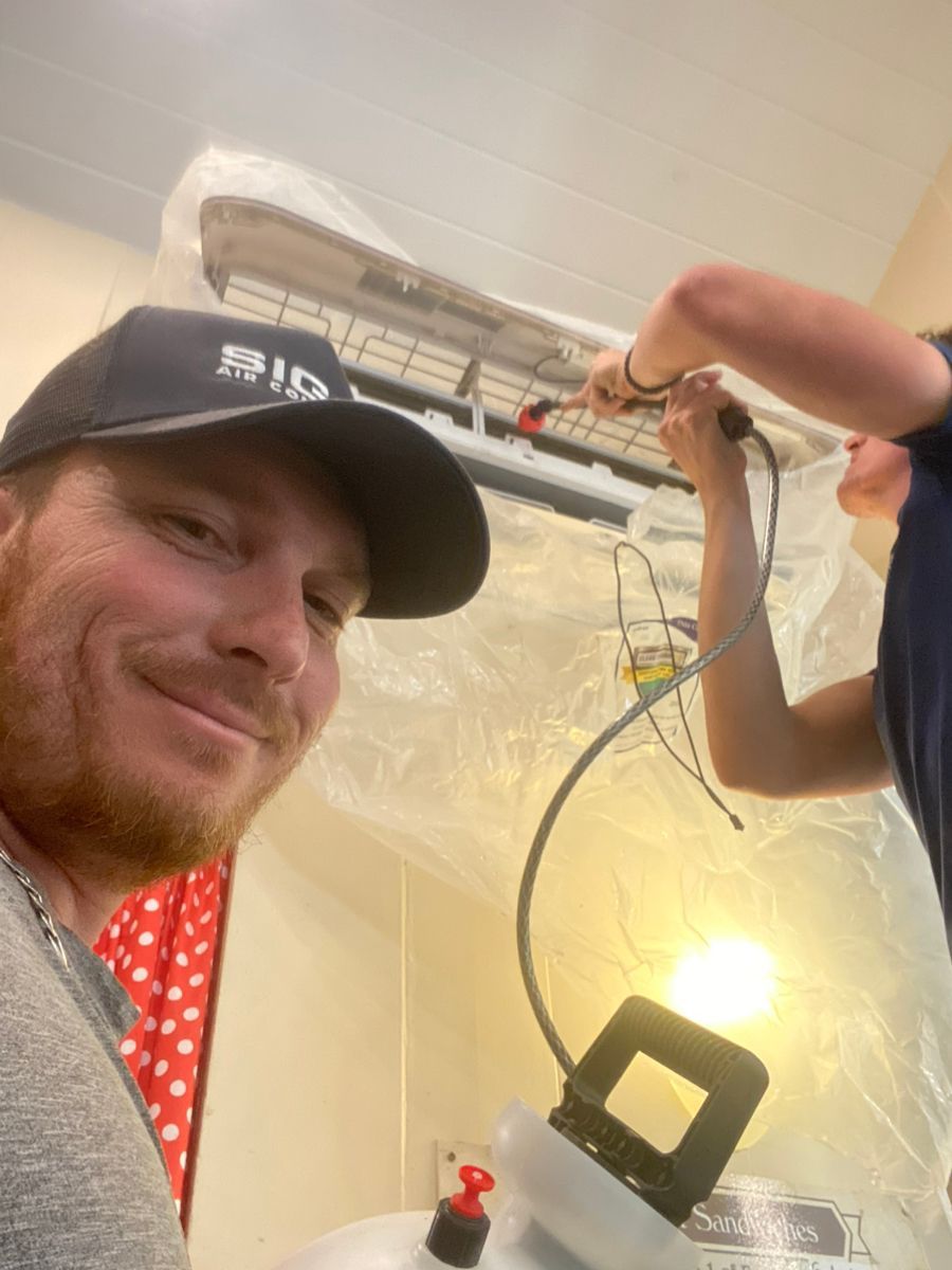 Siggs technicians repair minisplit service