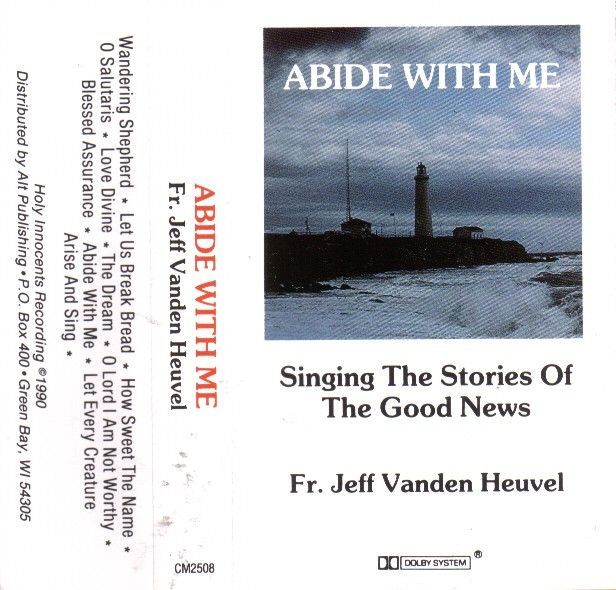 A cassette tape titled abide with me singing the stories of the good news