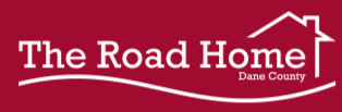 A red and white logo for the road home in dane county
