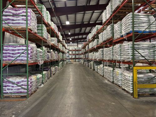 pallets of fertilizer in warehouse