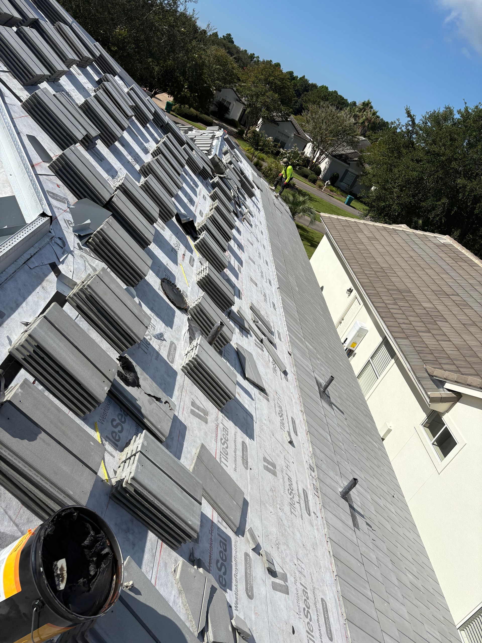 Completed residential roof exterior by Highmark Roofing Partners