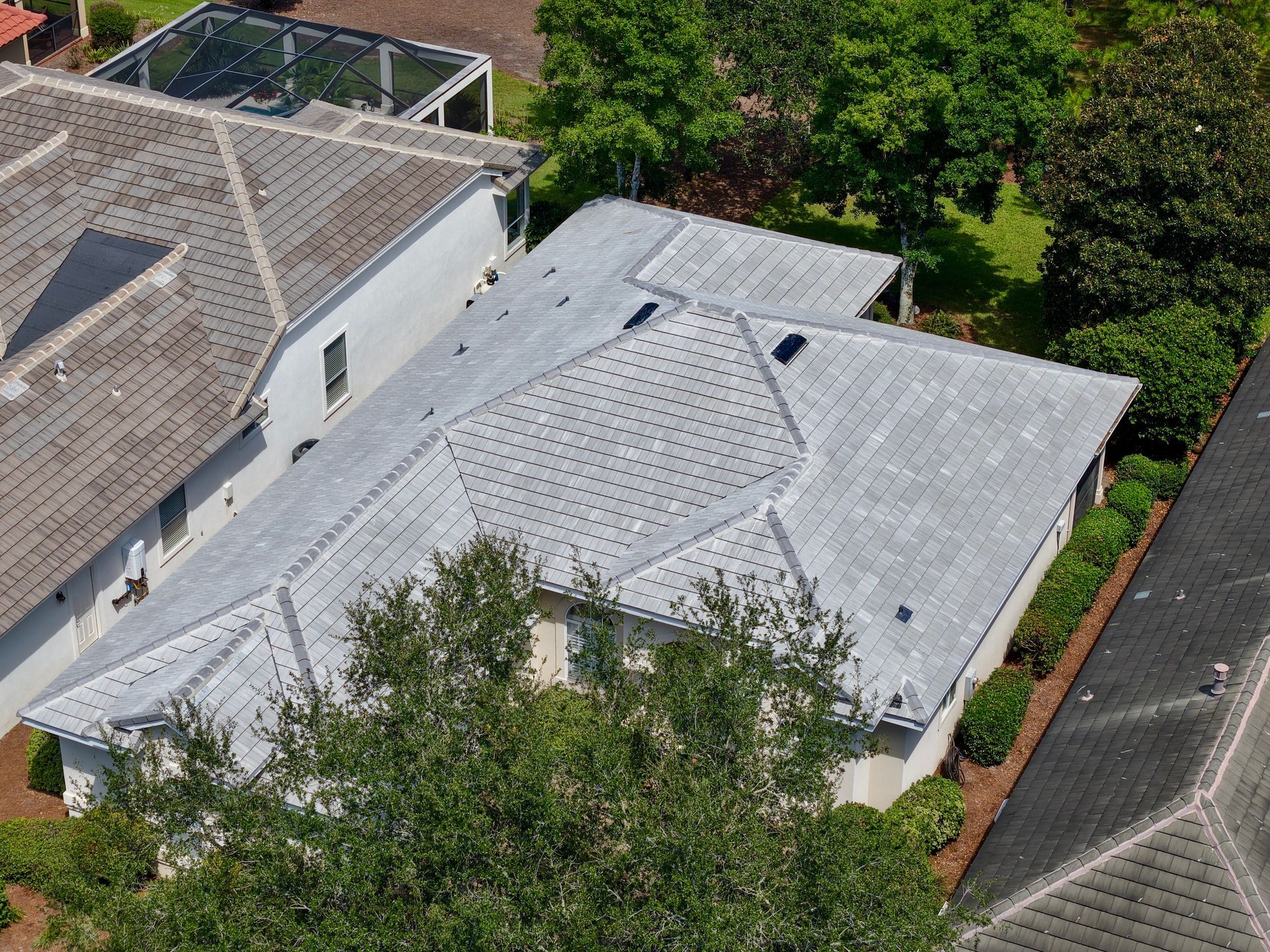 Commercial-style roof replacement aerial view by Highmark Roofing Partners