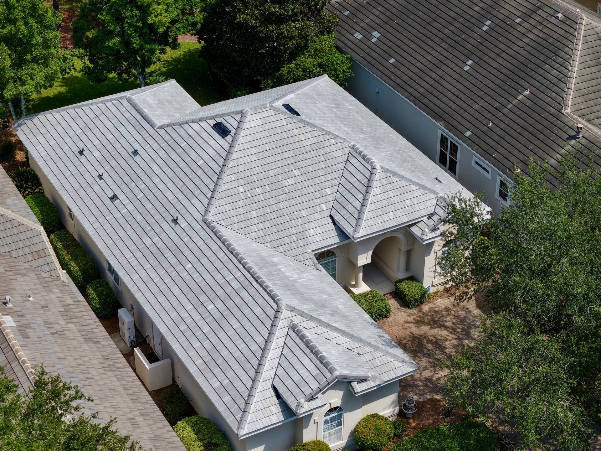 Residential metal roof aerial view by Highmark Roofing Partners