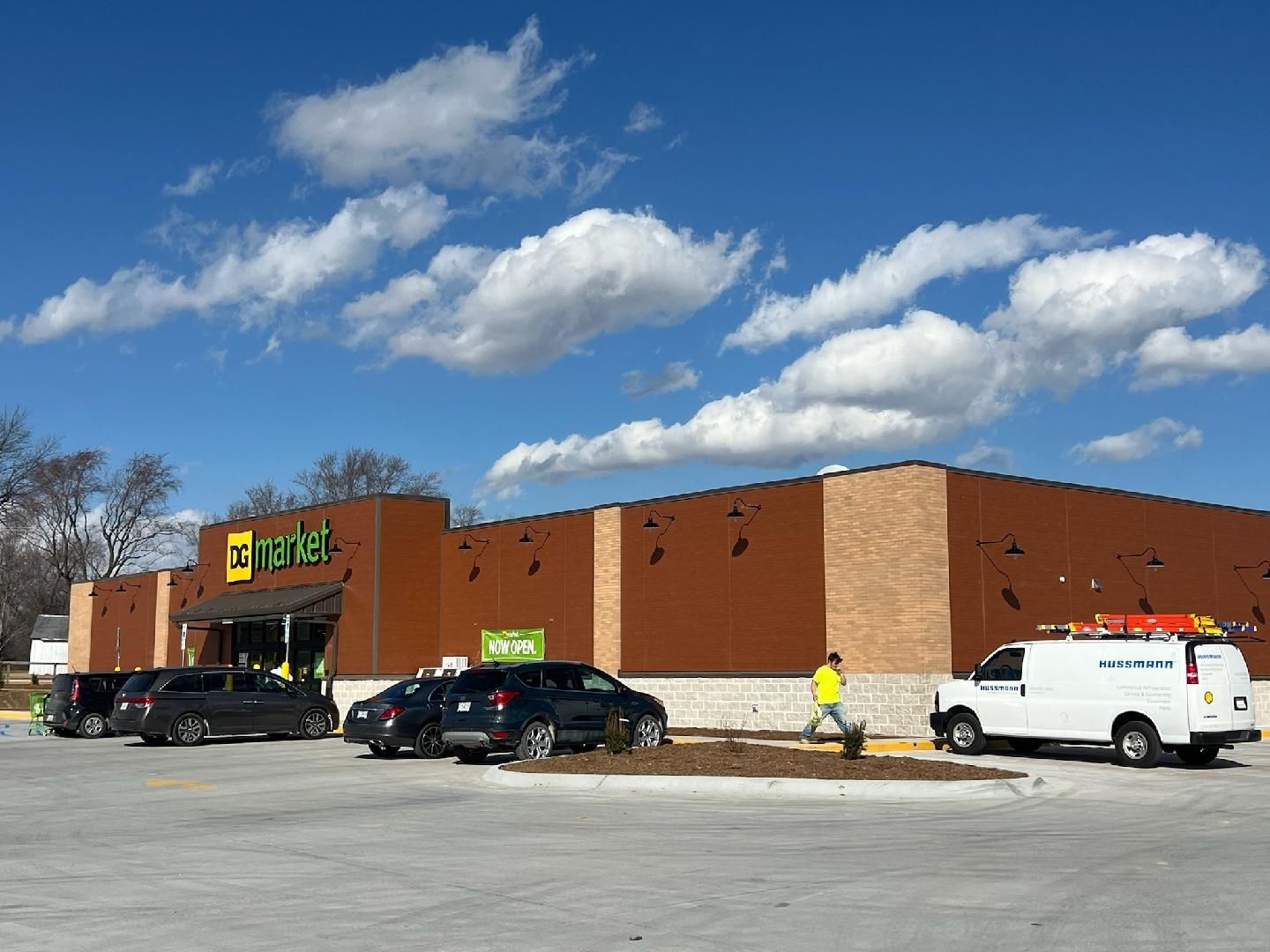 a large building with a lot of cars parked in front of it — Perry, MO — Grossmann Masonry, LLC