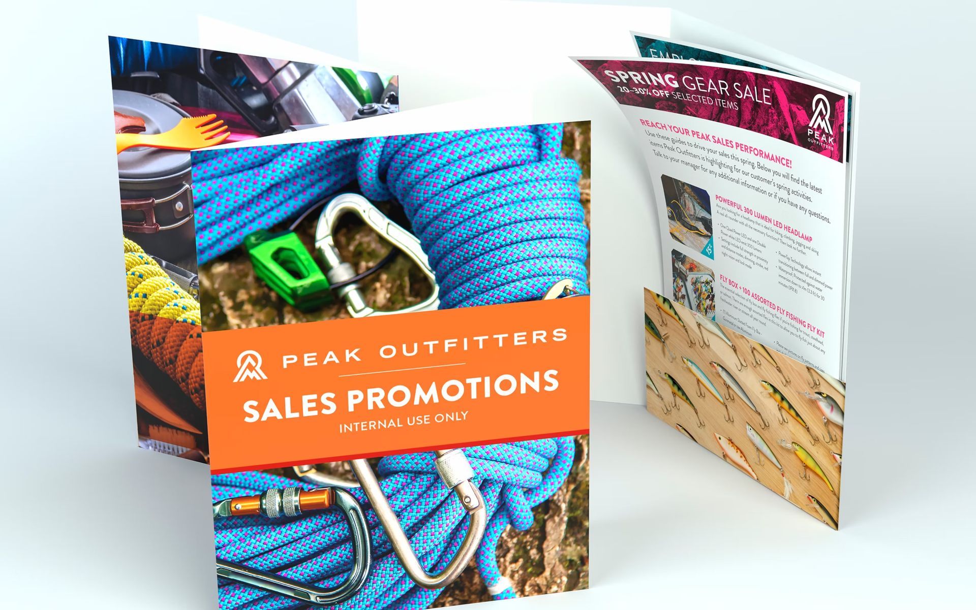 Brochure with blue rope and carabiner cover, inside pages and pocket; "Peak Outfitters Sales Promotions" orange banner.