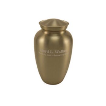 Gold memorial urn with engraved text on a white background