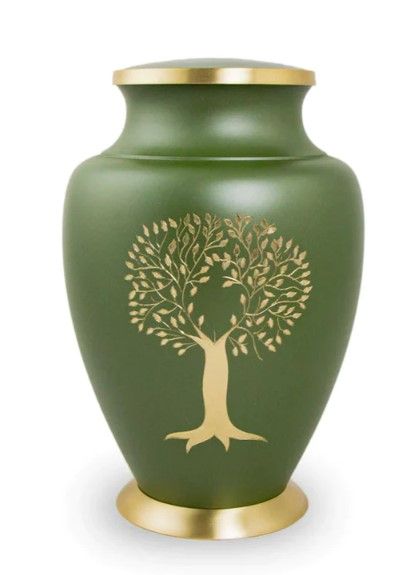 Green urn with gold trim and a gold tree design on the front