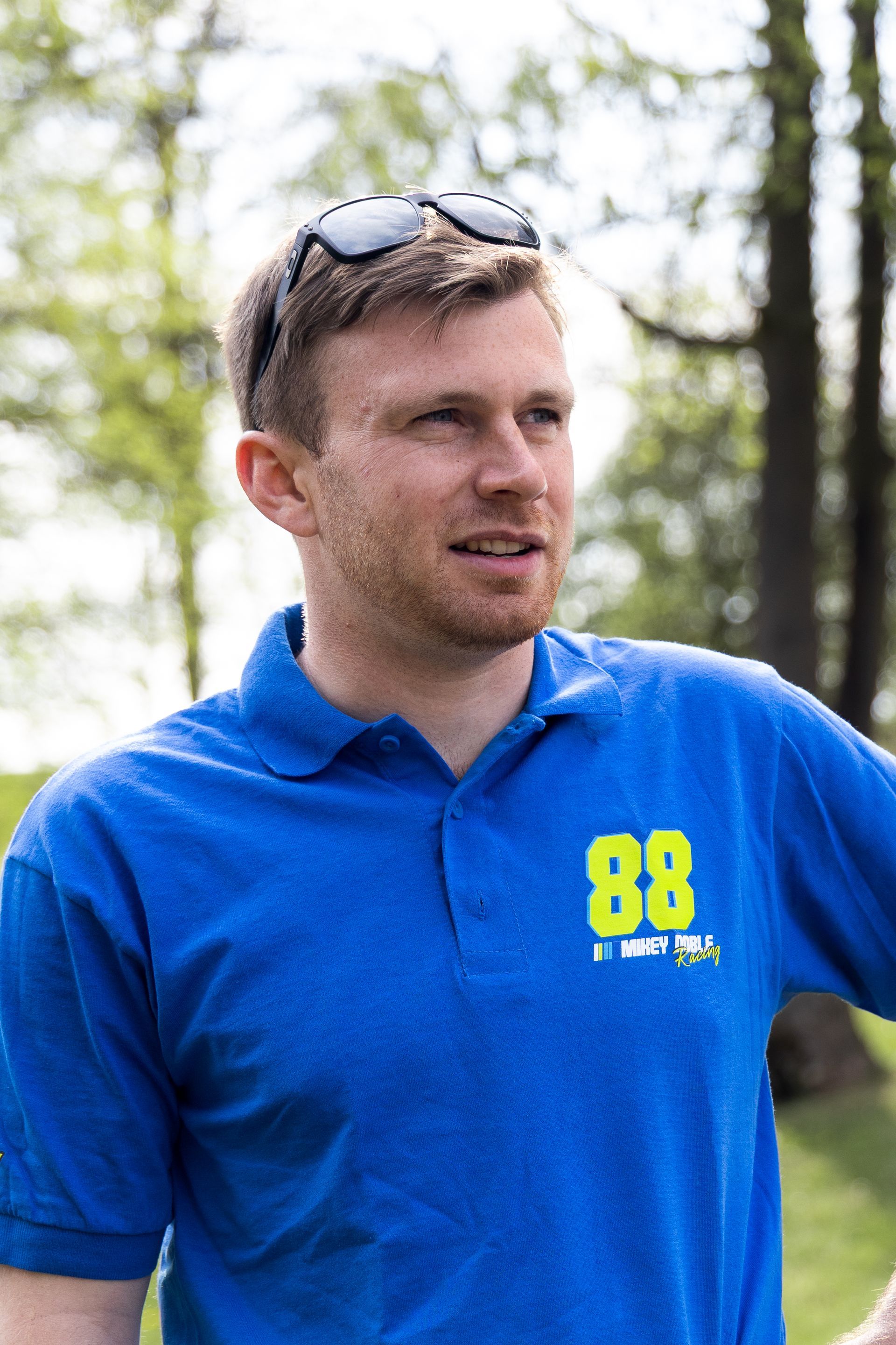 Mikey Doble modelling #88ARMY polo shirt at Donington Park circuit