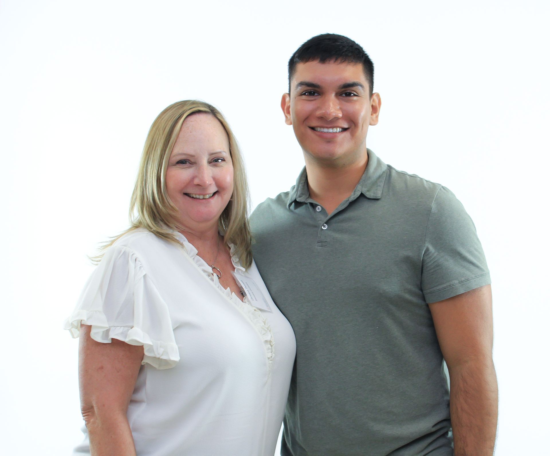 A man and a woman are posing for a picture together