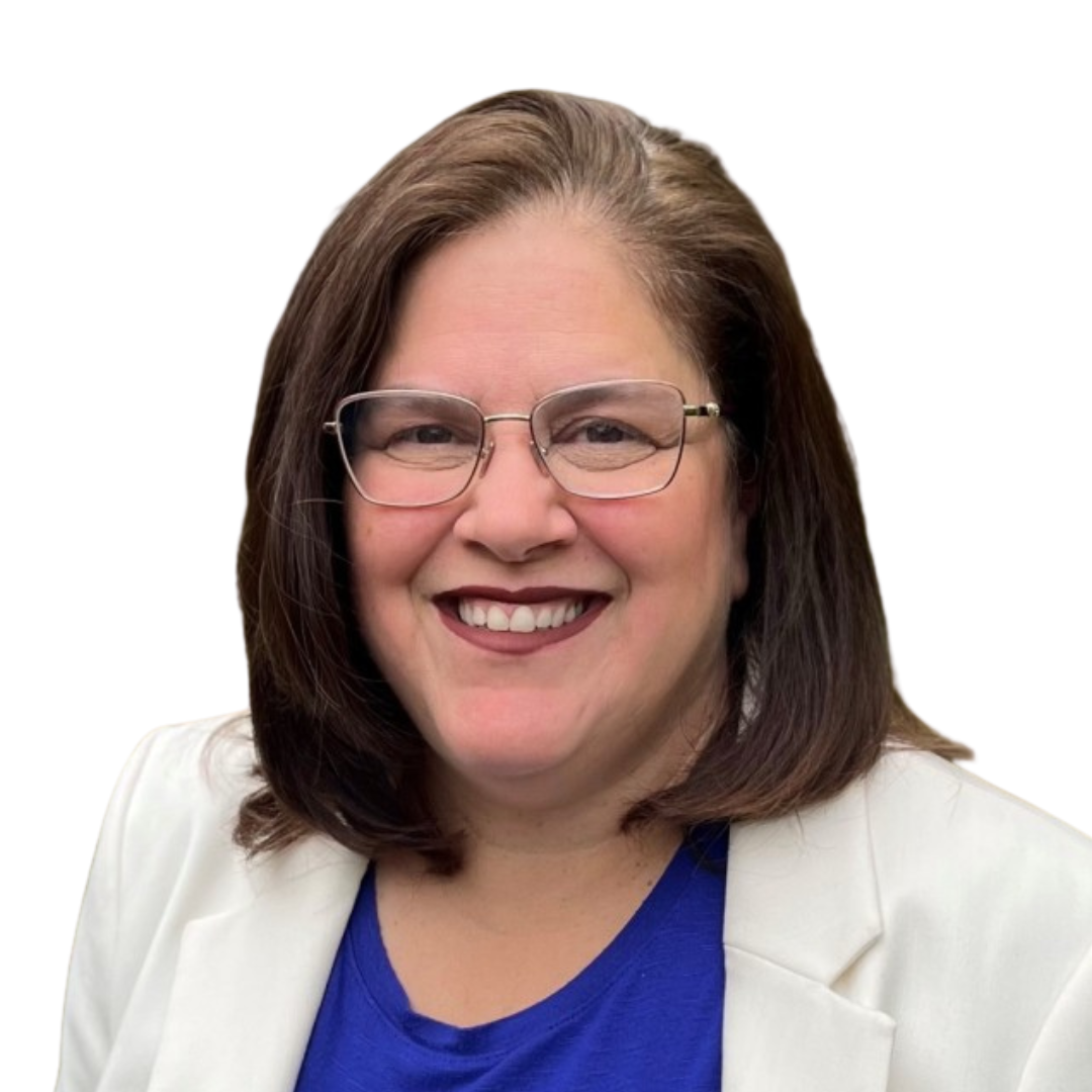 A woman wearing glasses and a white jacket is smiling