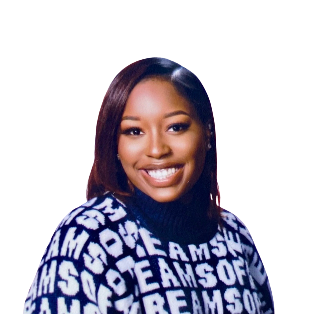 A woman wearing a black and white sweater with the word team on it