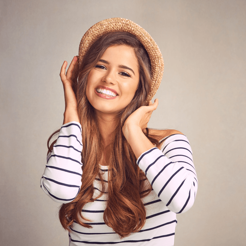 Woman smiling | Visit the best cosmetic dentist in Overland Park 66221 for top-quality dental care.