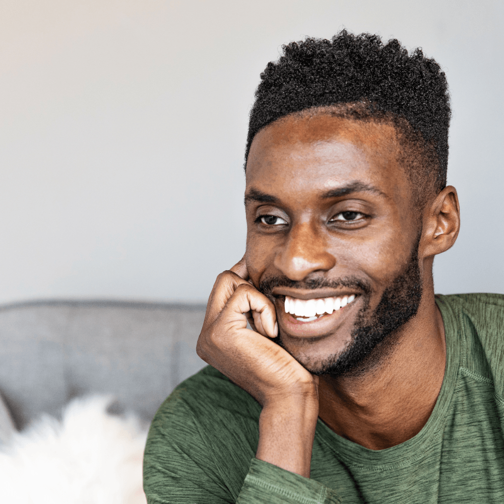 man smiling | Enhance your smile with custom veneers in Overland Park 66221.