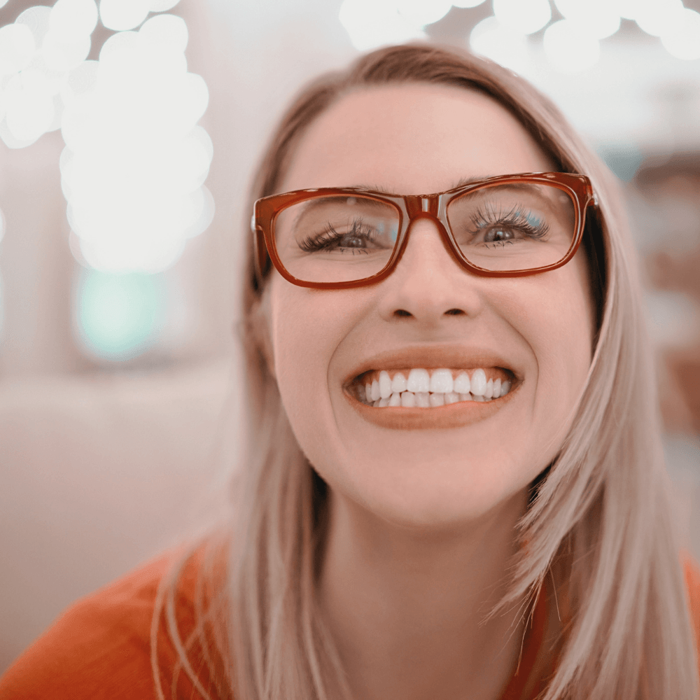 Woman smiling | Brighten your smile with teeth whitening in Overland Park 66221.