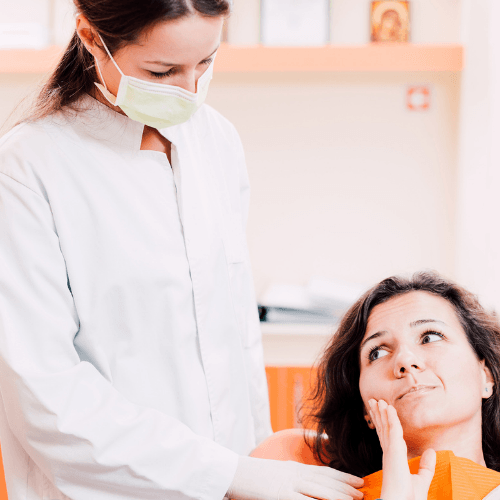 woman in tooth pain | Get care from a top-rated dentist in Overland Park 66221
