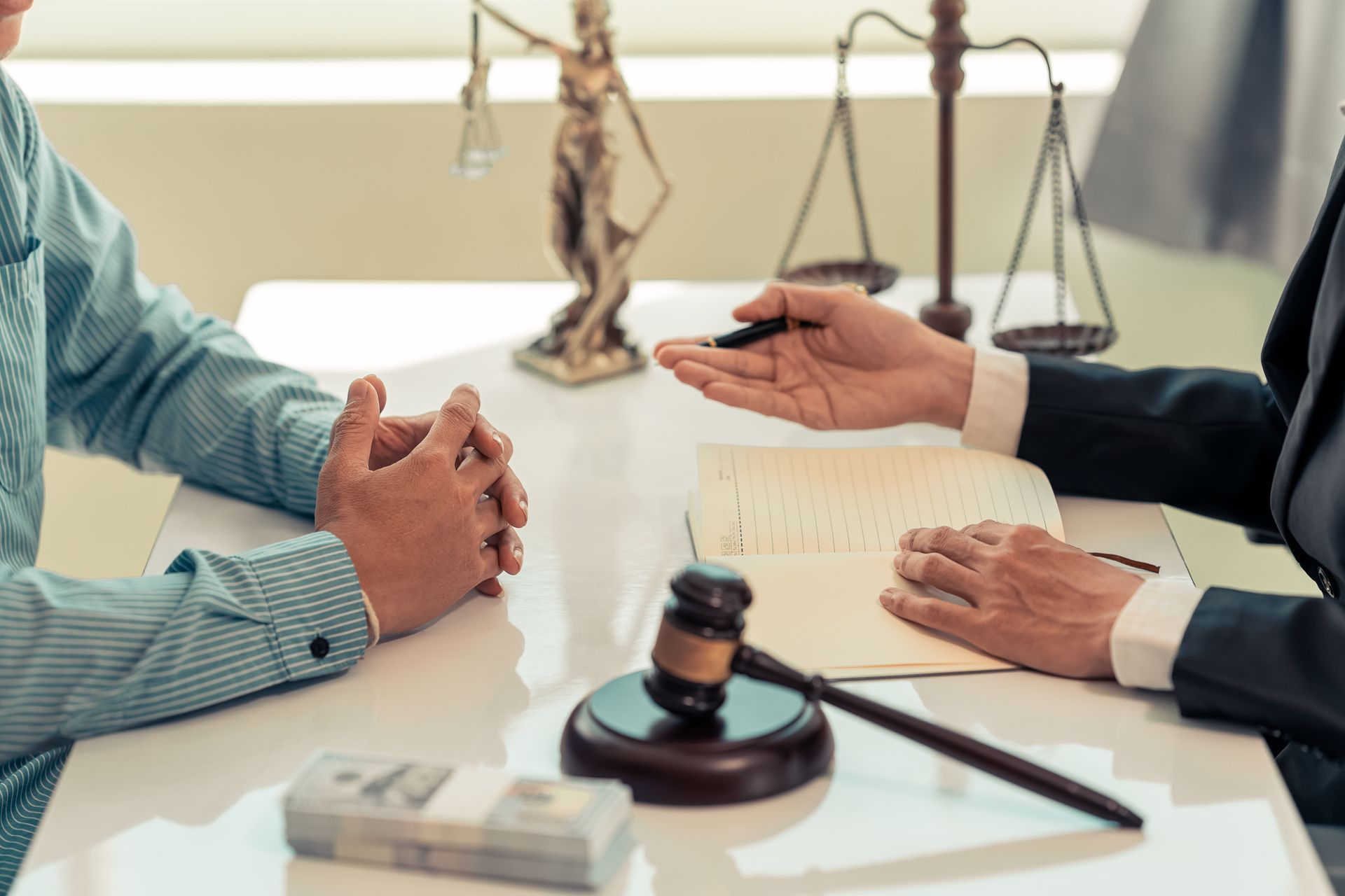 A lawyer is talking to his client. A lawyer is talking to his client.