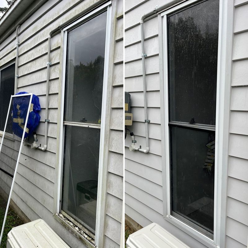 Two Exterior Window Views With White Siding and Attached Pipes — Jackson's Window Cleaning in Nerang, QLD