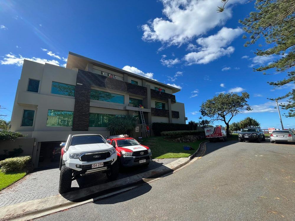 Multi-story Building With Tinted Windows — Jackson's Window Cleaning in Nerang, QLD