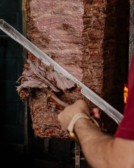 Fresh wood-fired döner on the rotisserie