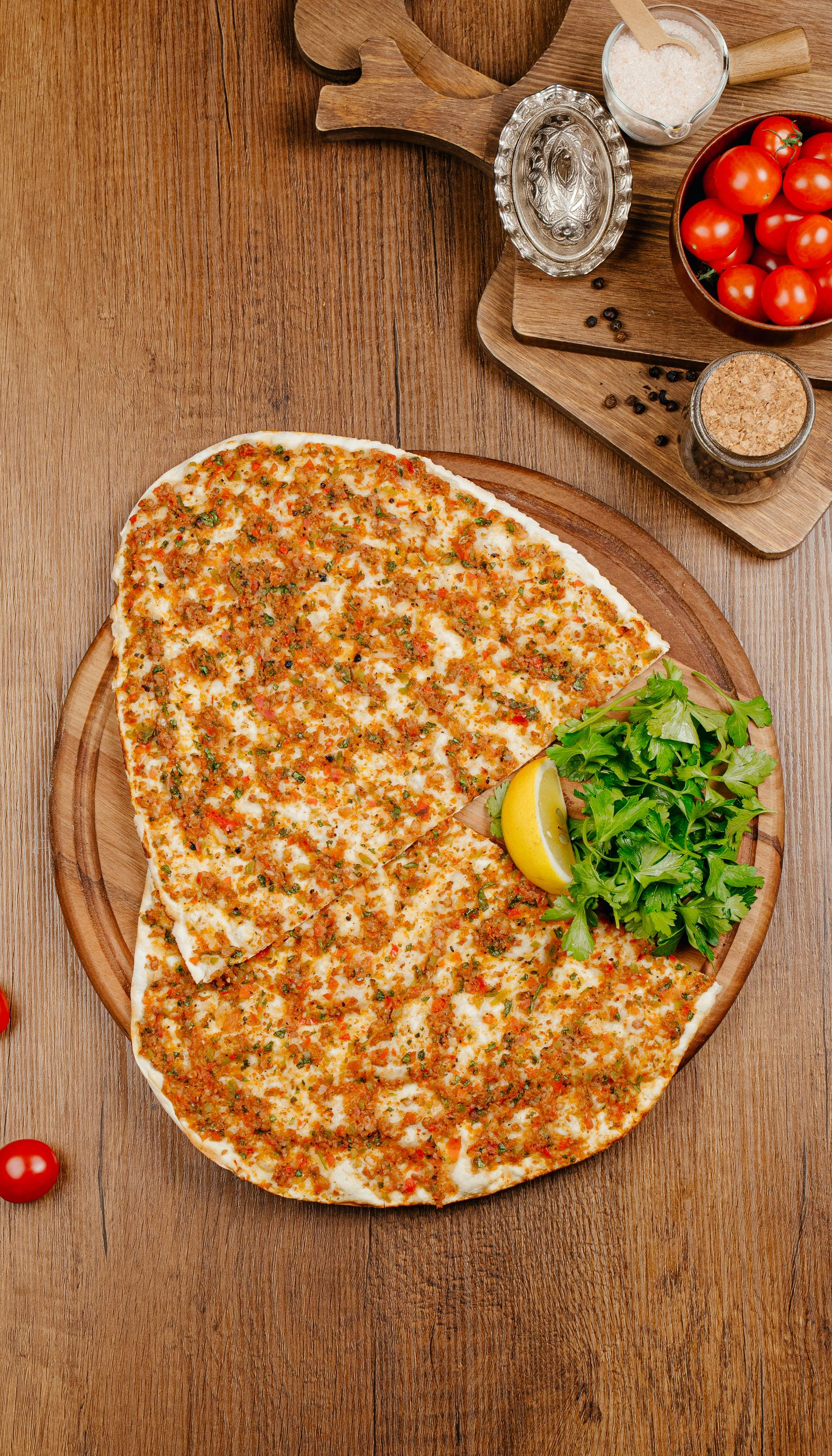 Freshly baked lahmacun with fresh ingredients