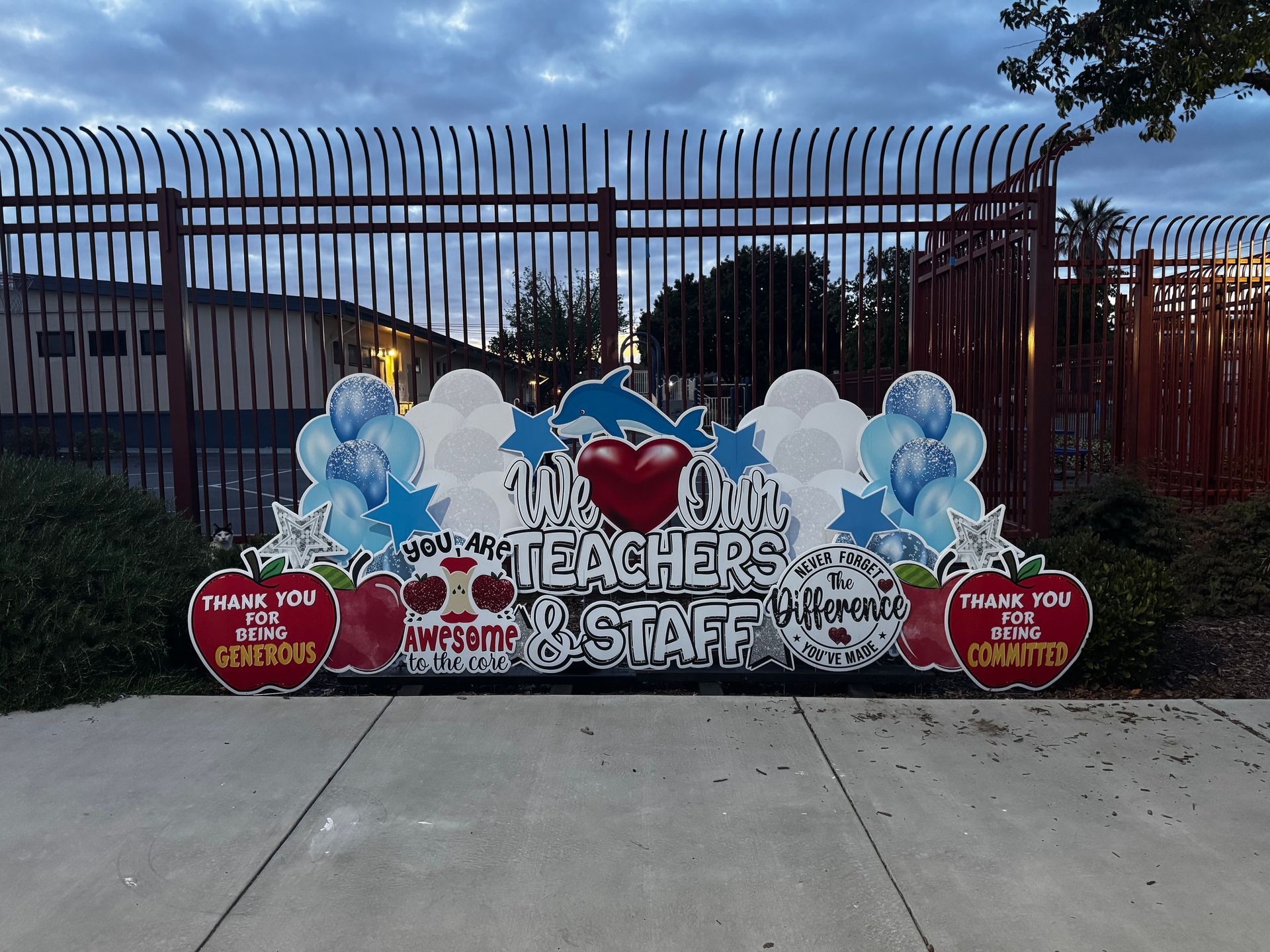 Teacher appreciation display in blue and white. It states, we love our teachers and staff. 