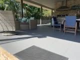 A Patio Space With a Neutral Gray Floor, and Outdoor Sofa — Priority Painters in Gladstone Central, QLD