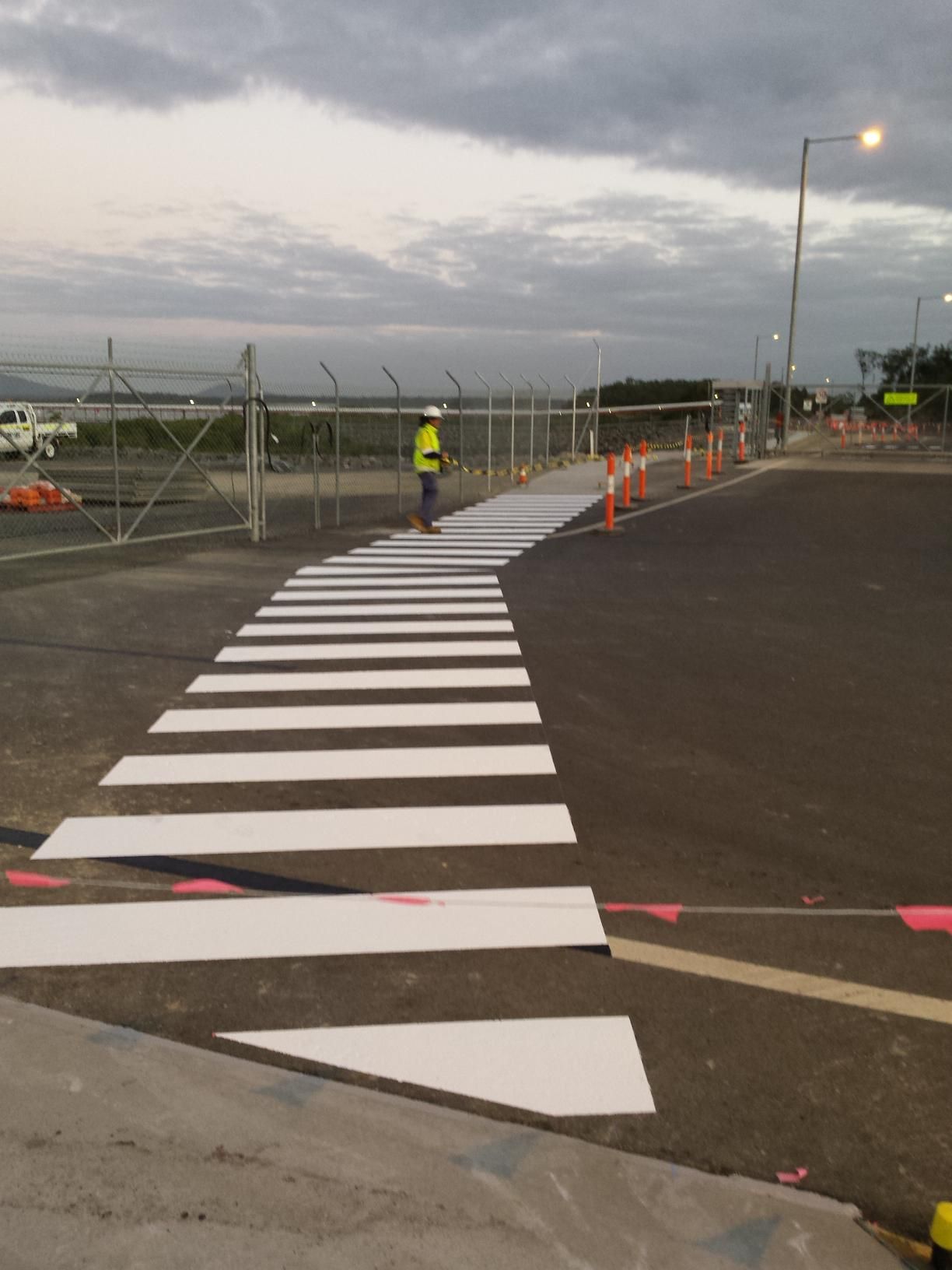 Painted White Crosswalk on a Paved Road — Priority Painters in Gladstone Central, QLD