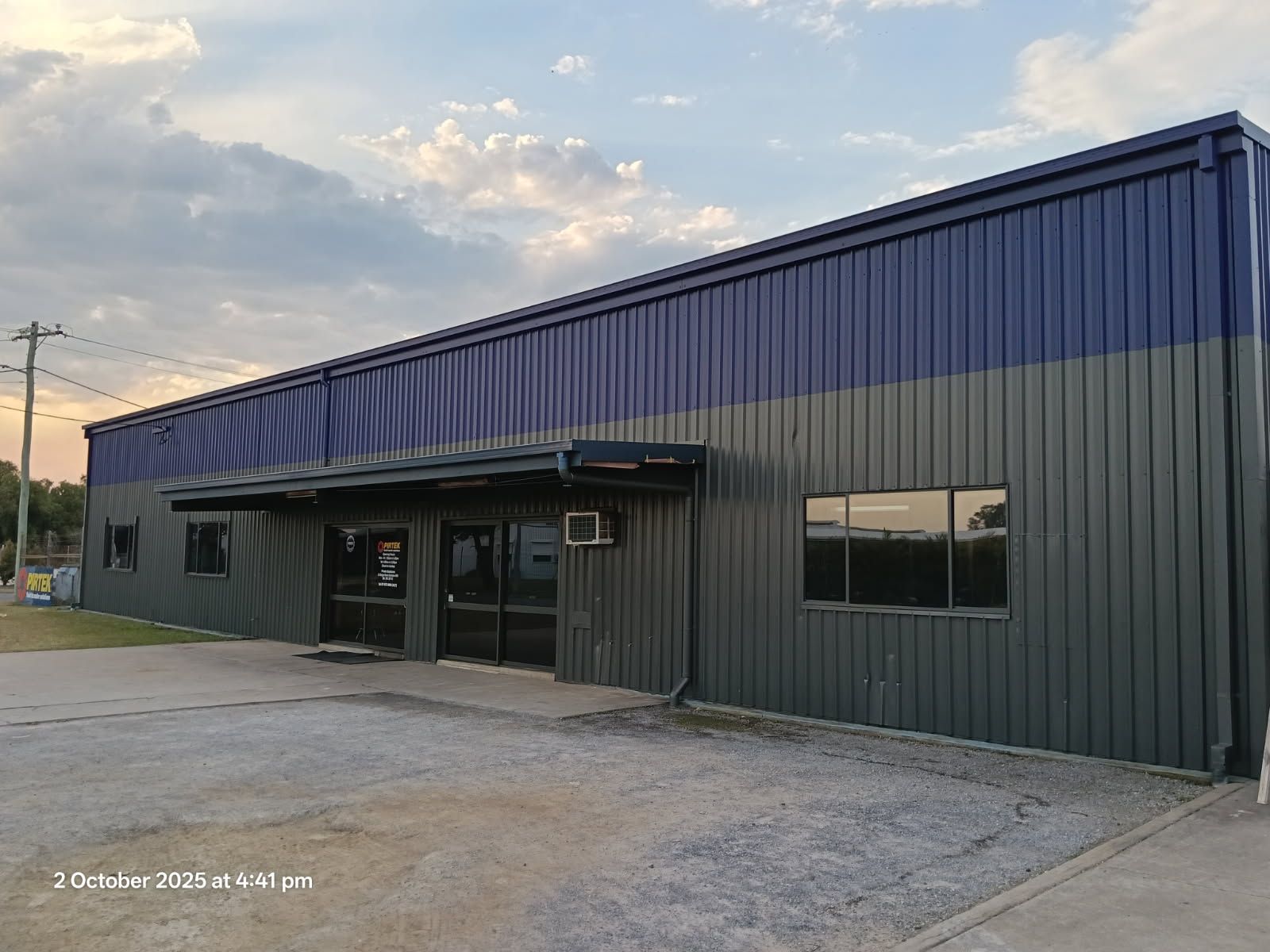 A Modern Warehouse Dual-toned Blue and Grey Wall Paint — Priority Painters in Gladstone Central, QLD