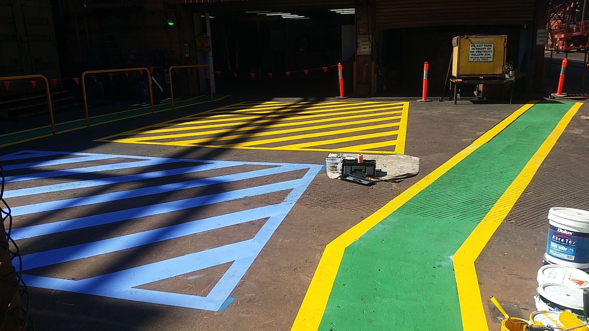 Newly Painted Yellow Hatched, Blue Hatched, and Green Walkway Markings — Priority Painters in Gladstone Central, QLD