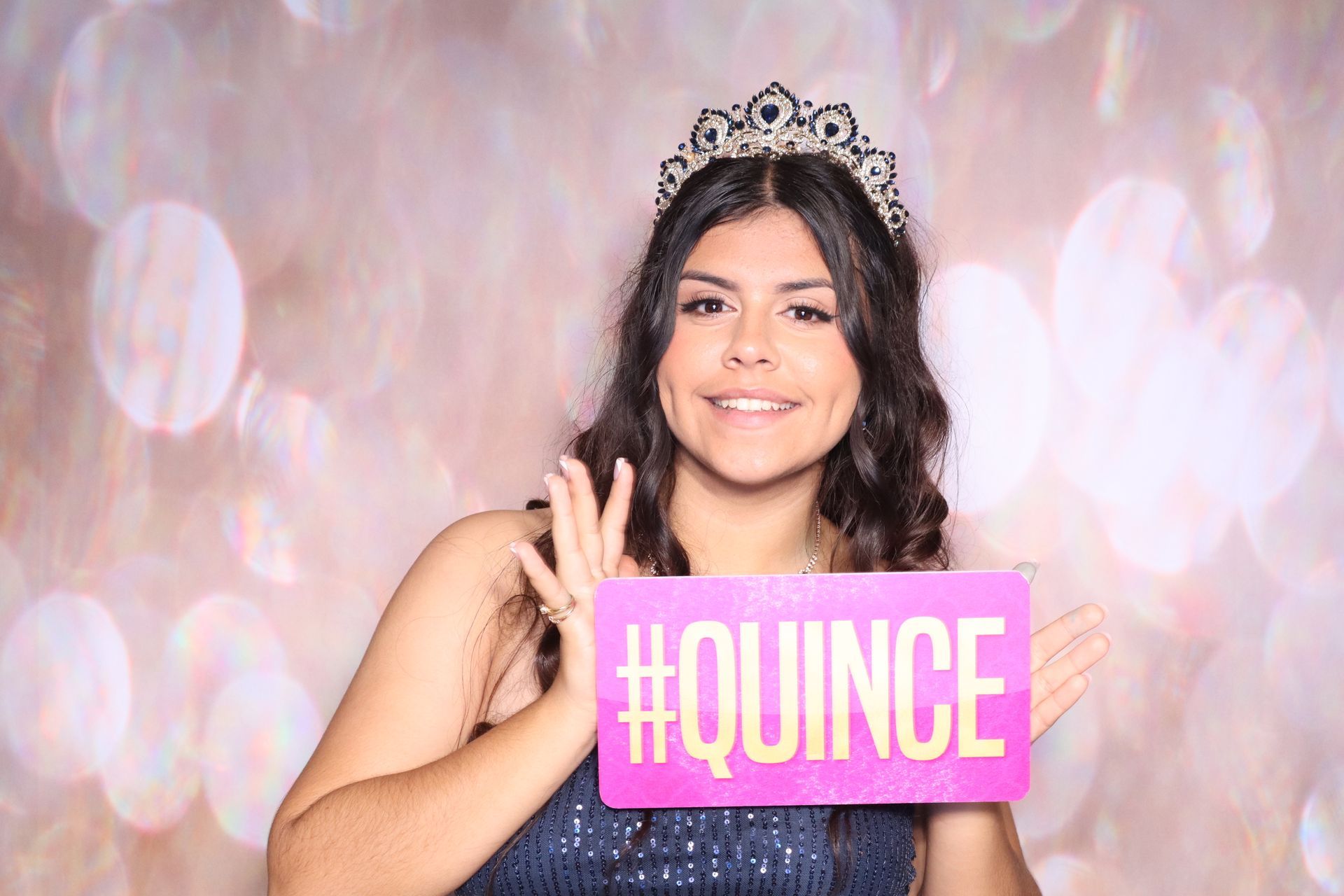 Hailey enjoying her quinceañera photo booth experience at Rancho Las Palmas in Perris, CA