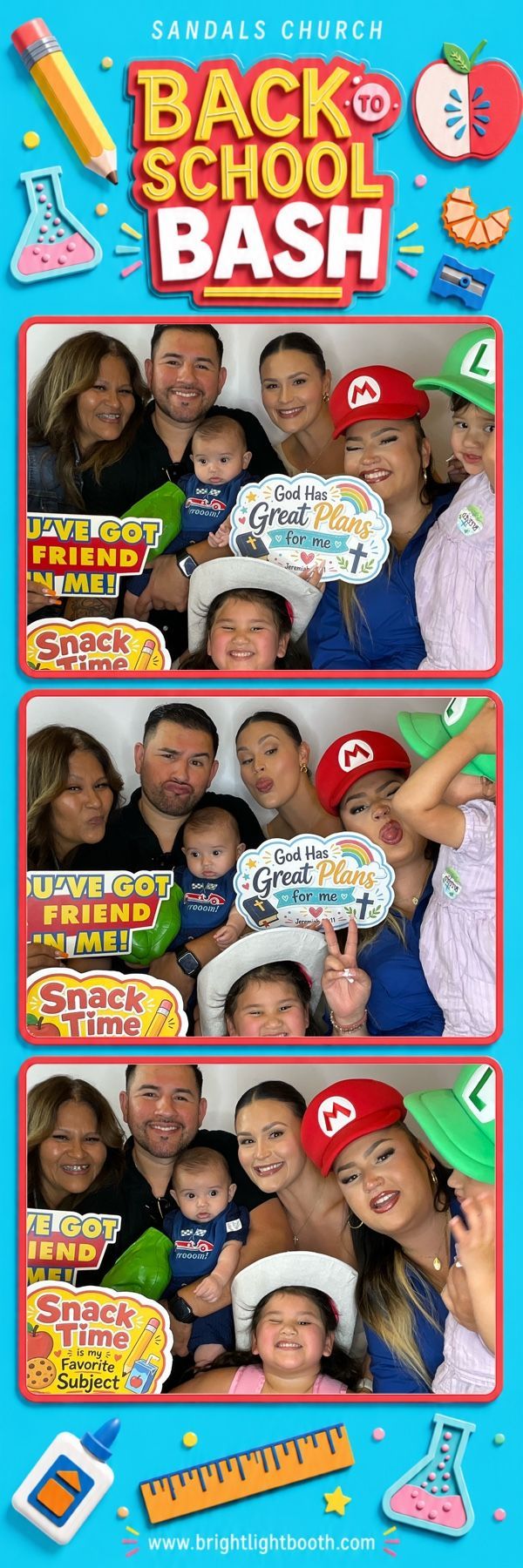 Family posing with fun props at the Sandals Church Back to School Bash in Riverside, CA