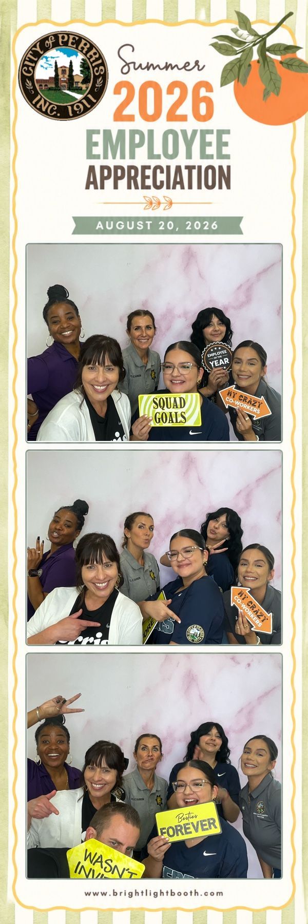 City of Perris employees posing at the photo booth with Pink Stone Backdrop