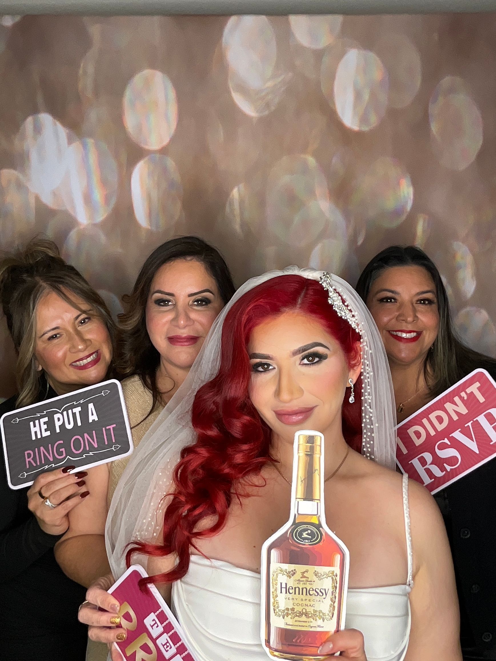 Bride and bridal party enjoying the Brightlight wedding photo booth at a luxury wedding reception in Menifee, California