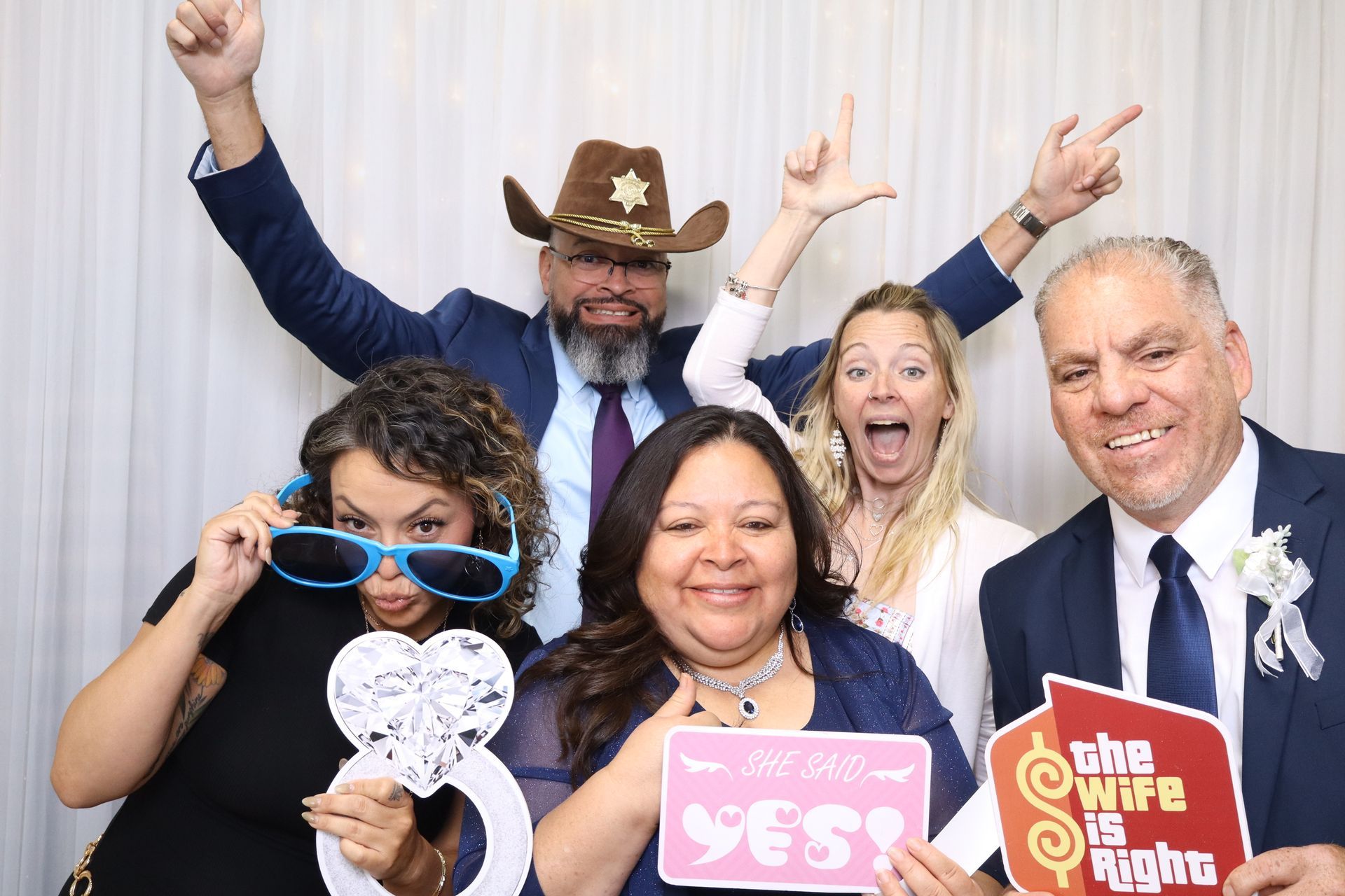 Wedding guests celebrating with Brightlight Photo Booth during a Southern California wedding reception