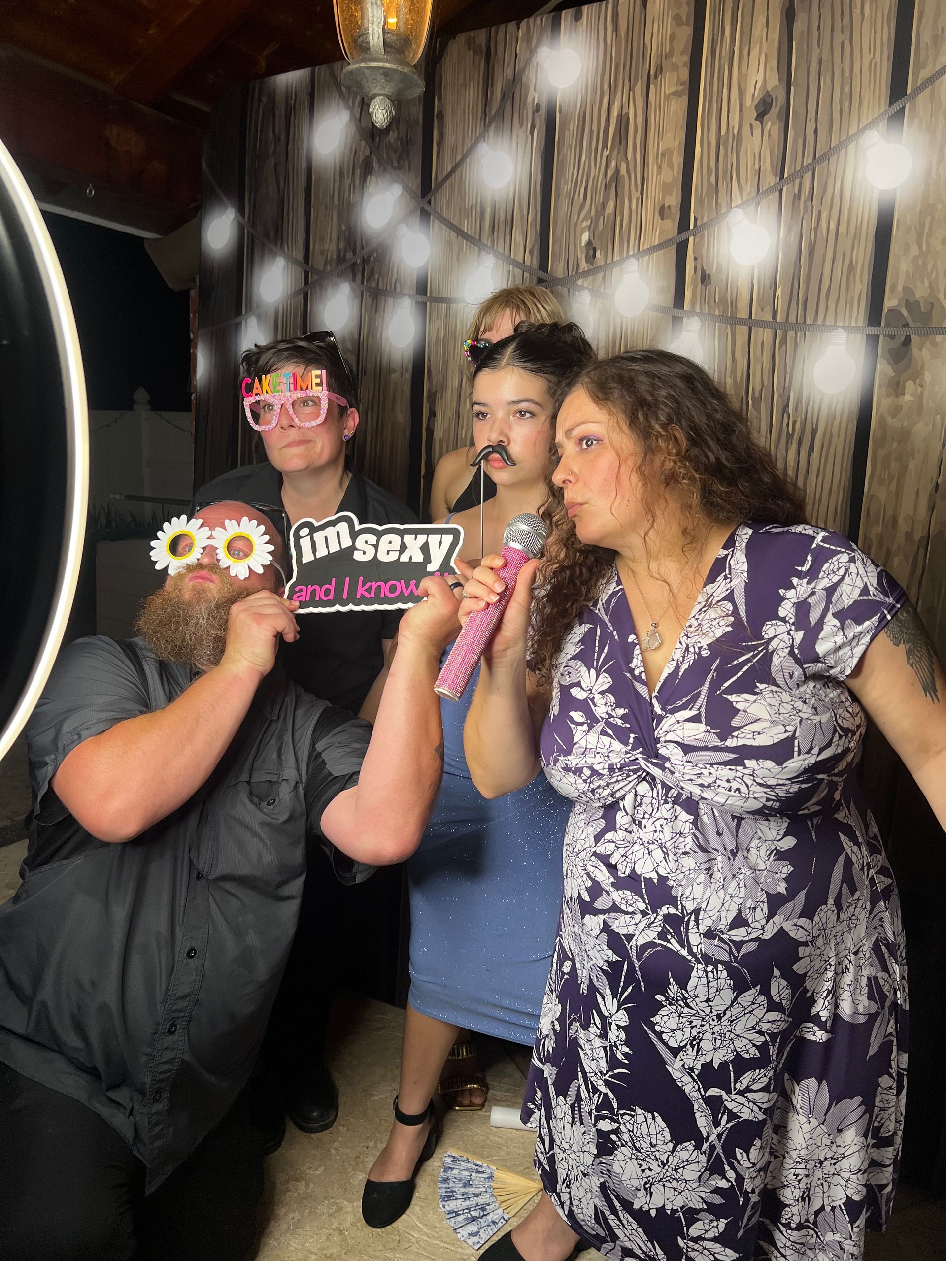 Guests enjoying the Luxe Prints Photo Booth Experience at Lizzie’s Quinceañera in Riverside, CA