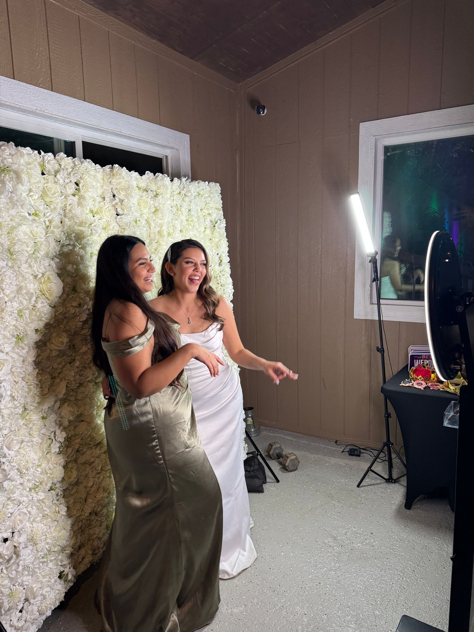Bride enjoying the Brightlight Photo Booth at her Rancho Las Palmas wedding in Perris, CA